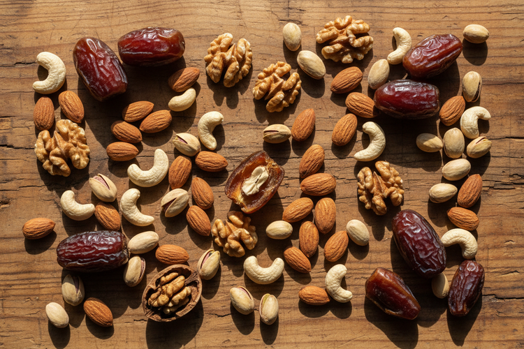 dates and nuts spread across, no white background
