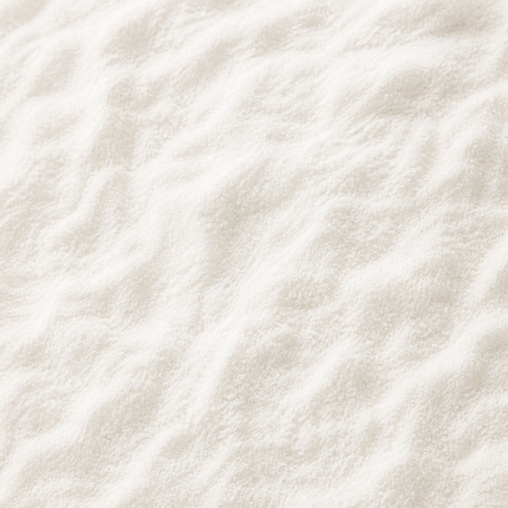 Close-up texture of fine white hydrolyzed bovine collagen peptide powder